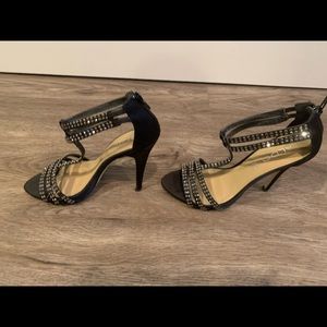 Strappy black heels with sparkly studded detail